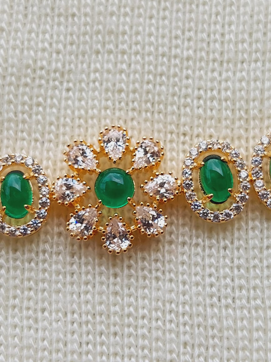 Adjustable Green Pota Mani American Diamond Bracelet from Mugdha Jewellery Store