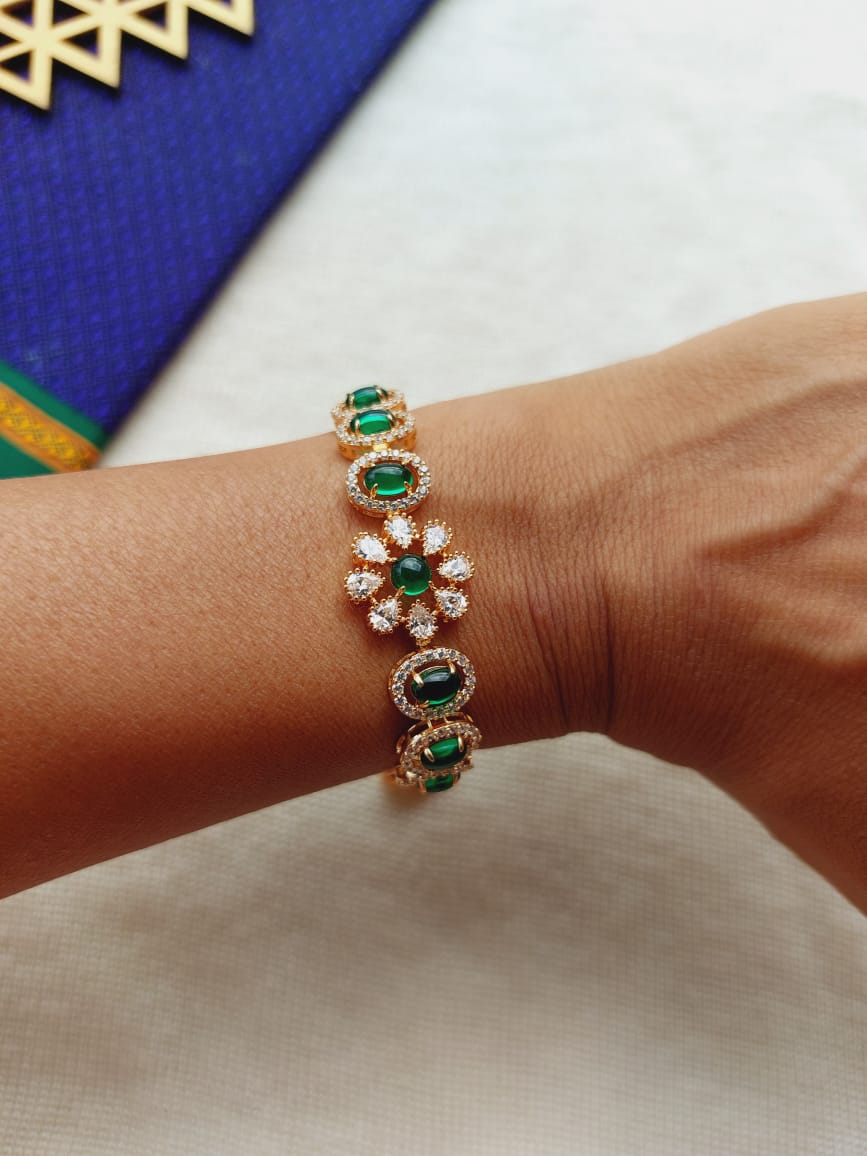 Elegant Emerald and Diamond Flower Bracelet from Mugdha Jewellery Store