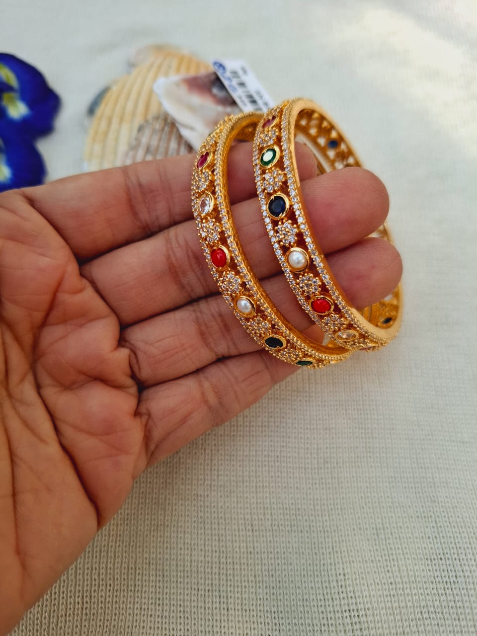 Intricate Multi-Gem Embellished Golden Bangles from Mugdha Jewellery Store