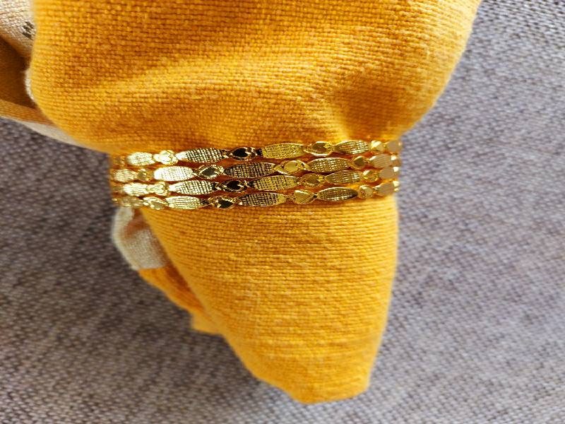 Dazzling Gold-Tone Heart Bangles Set of 4, Size 2 by 4 Inches