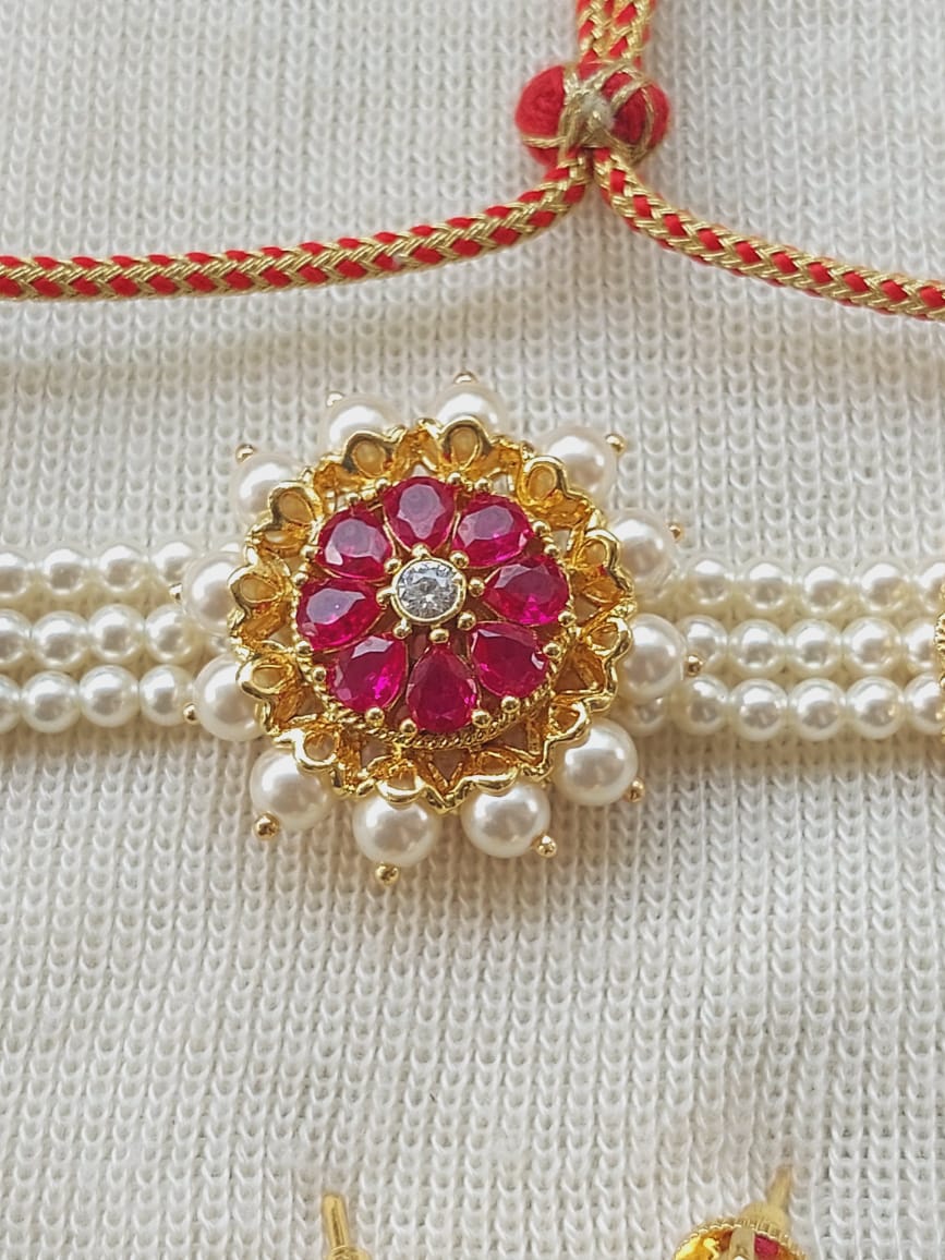 Elegant pearl and gem choker necklace from Mugdha Jewellery Store