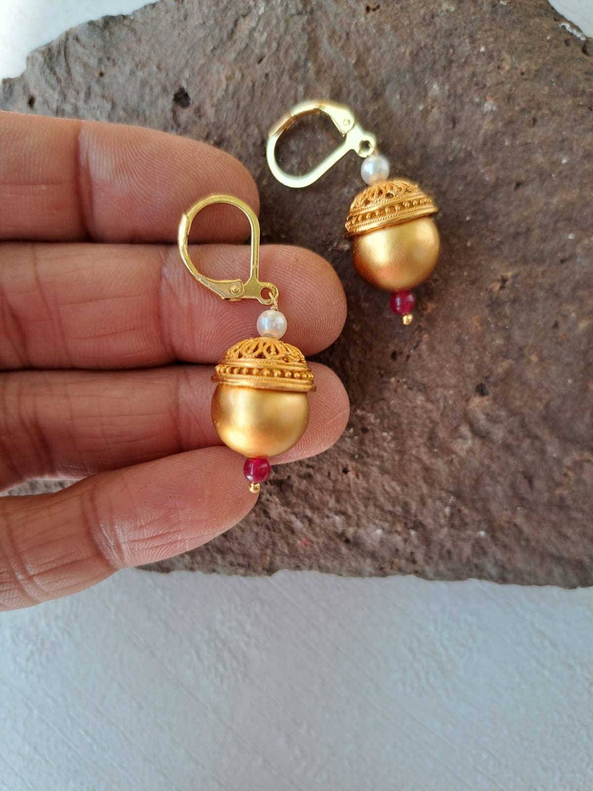 Ornate Golden and Red Bead Dangler Earrings from Mugdha Jewellery Store