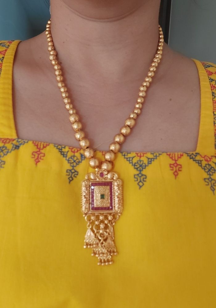 Elegant square-shaped pendant necklace with pearl beads, featured in Mugdha Jewellery Store