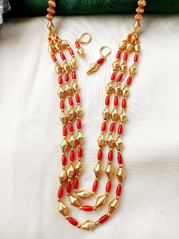 Three-layered coral and gold designer jewelry set from Mugdha Jewellery Store