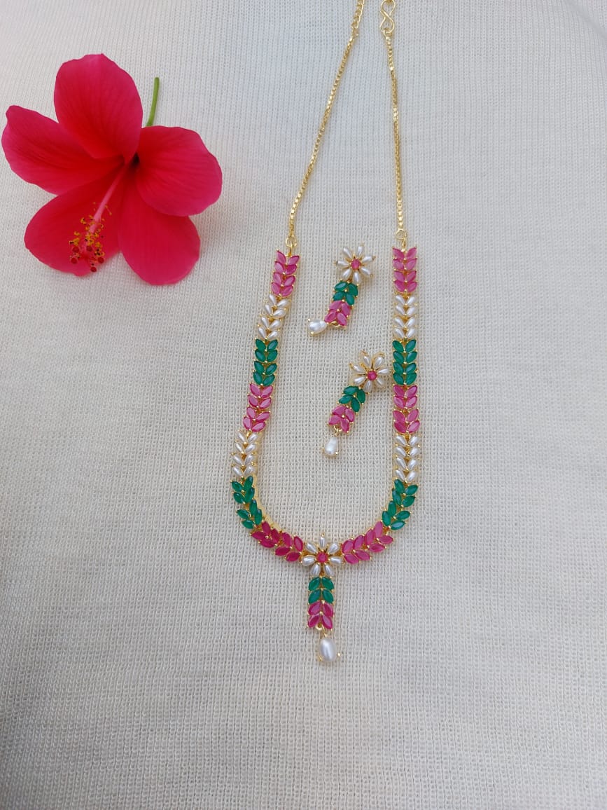 Delicate multicoloured flower leaf necklace and earrings from Mugdha Jewellery Store