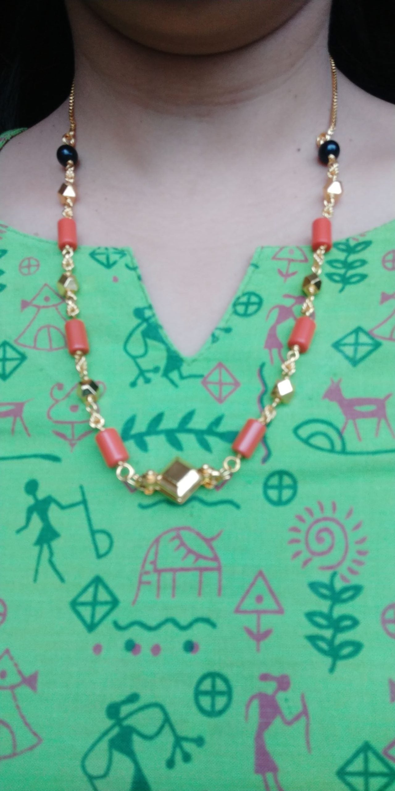 Elegant round beads and coral accents necklace from Mugdha Jewellery Store