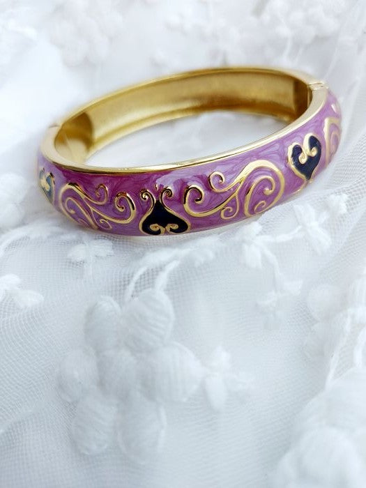 Violet Kada: Elegant gold-plated bangle with intricate purple and black enamel detailing