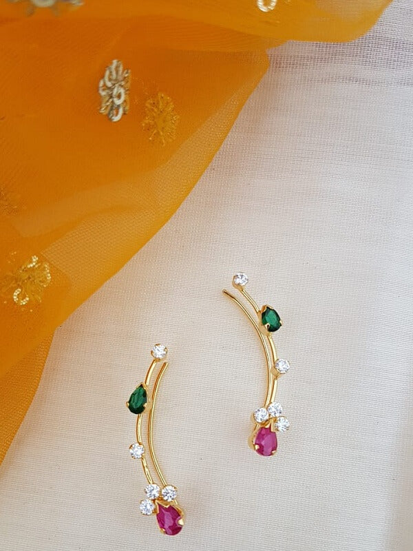 Multicolour drop earrings from Mugdha Jewellery Store with ruby and emerald accents on a golden hoop design.