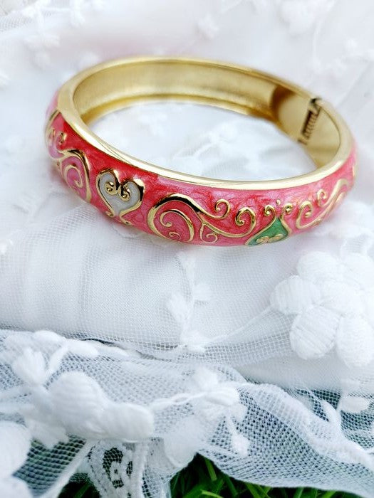 Elegant gold-toned pink and floral patterned kada bracelet from Mugdha Jewellery Store