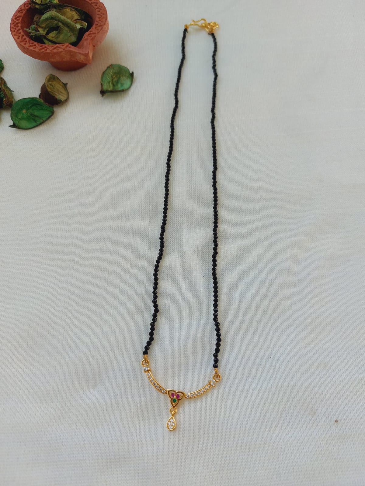 Elegant Black Beaded Mangalsutra with Gold Accents