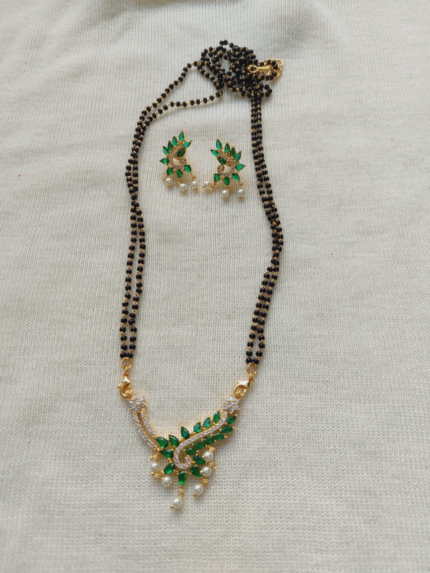 Green Designer Pendant Mangalsutra with Decorative Gold and Green Accents