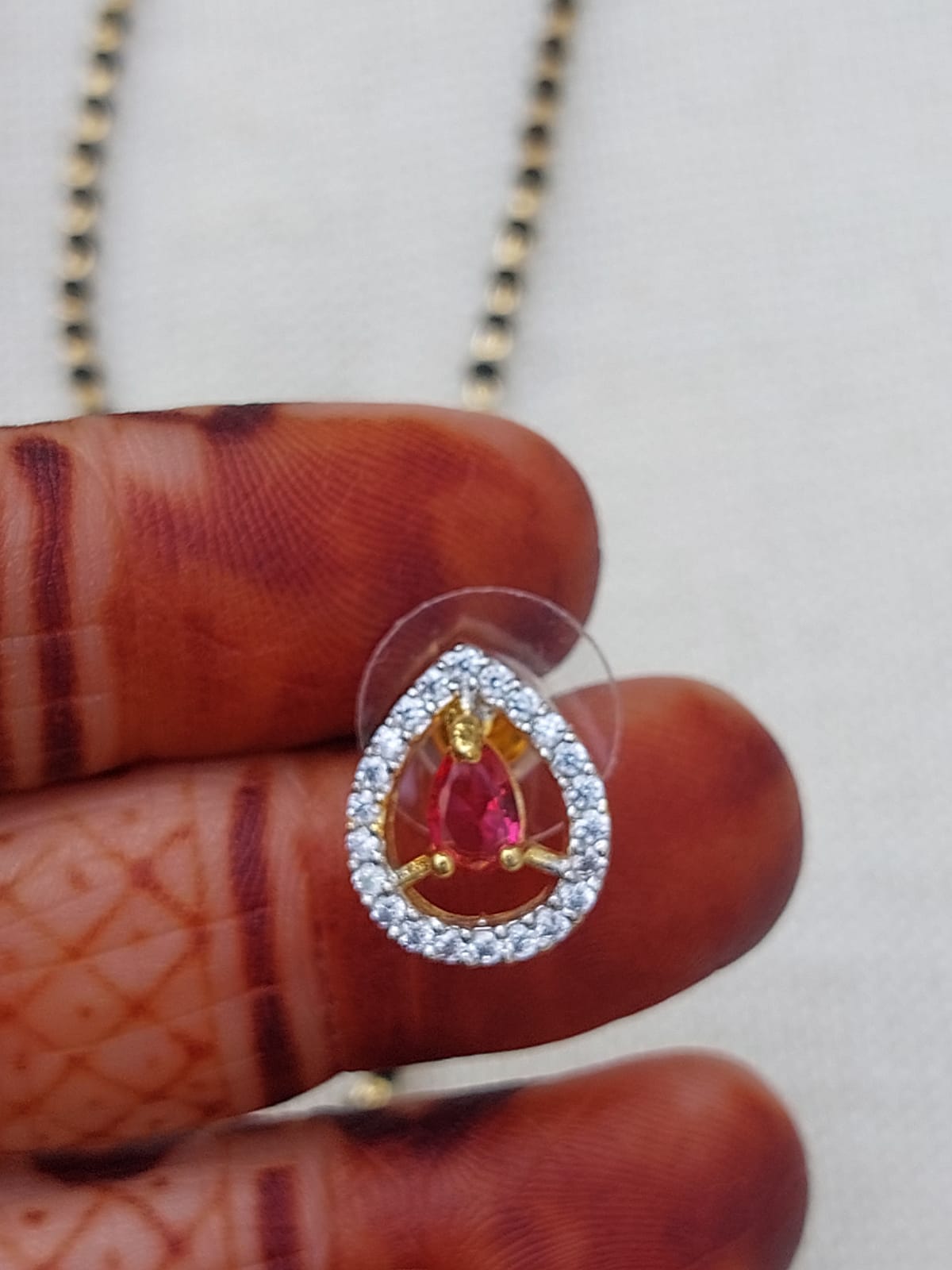 Elegant Red Stone Short Mangalsutra - Sparkling Gemstone Pendant on Golden Chain