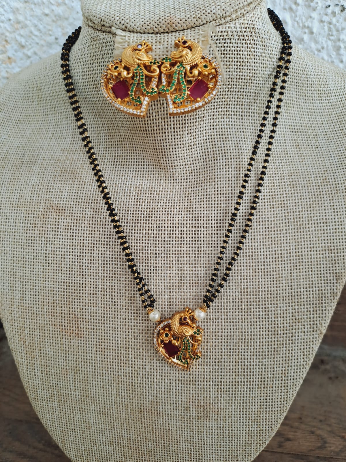 Elegant Peacock Short Mangalsutra with Intricate Golden Motifs