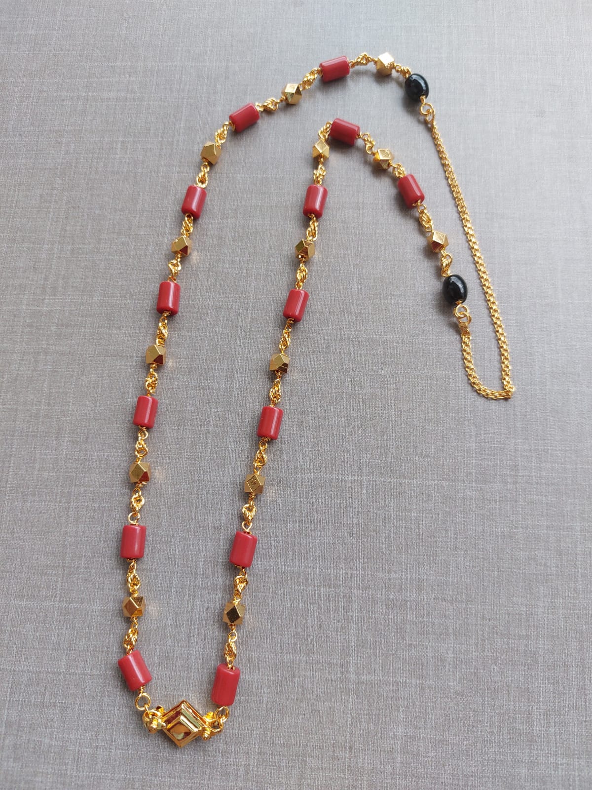 Elegant red bead and gold chain necklace from Mugdha Jewellery Store