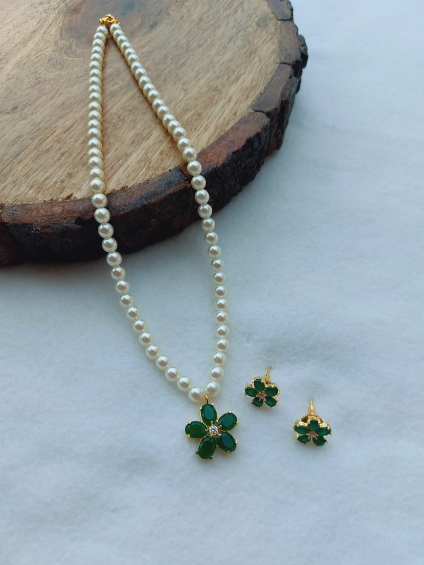 Elegant Pearl Set with Green Flower Accents