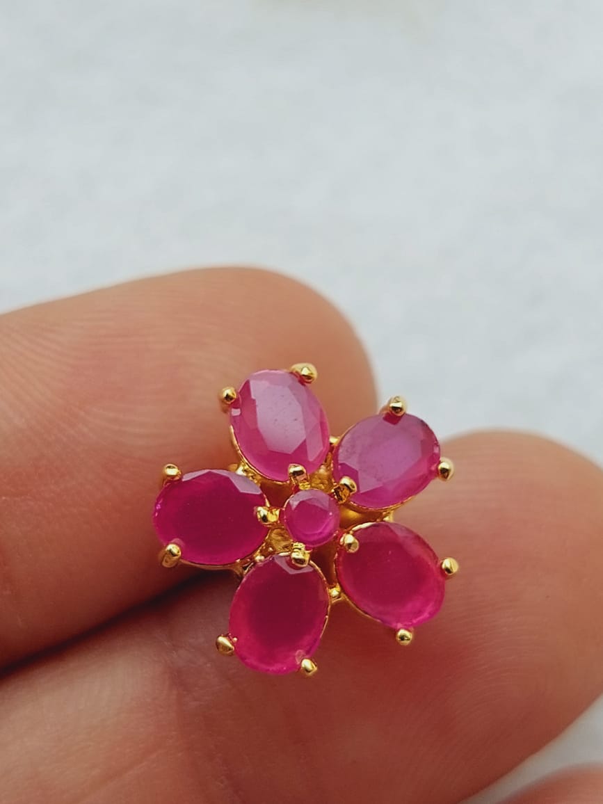 Elegant pink flower pearl jewelry set displayed on fingers in image