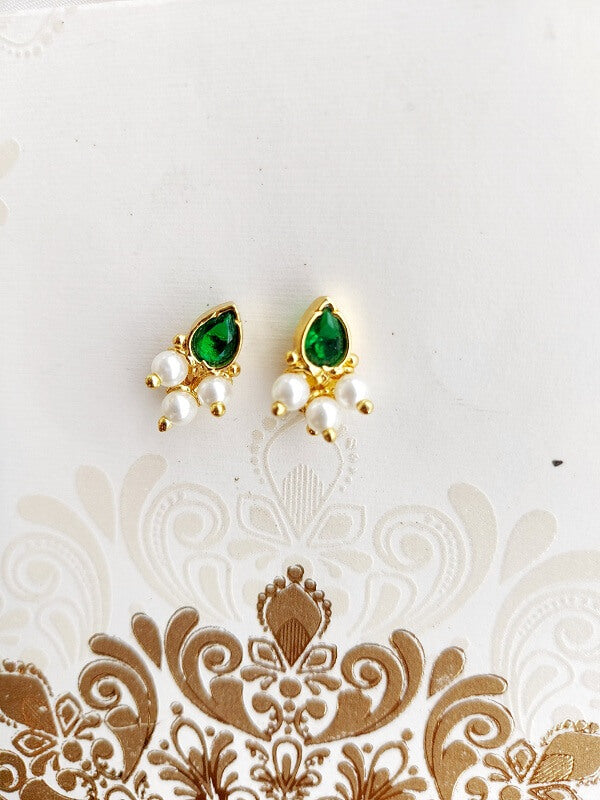 Green Stone Karwwari Draksha Small Earrings by Mugdha Jewellery Store - Elegant teardrop-shaped emerald green gemstones with intricate gold detailing and pearl accents.