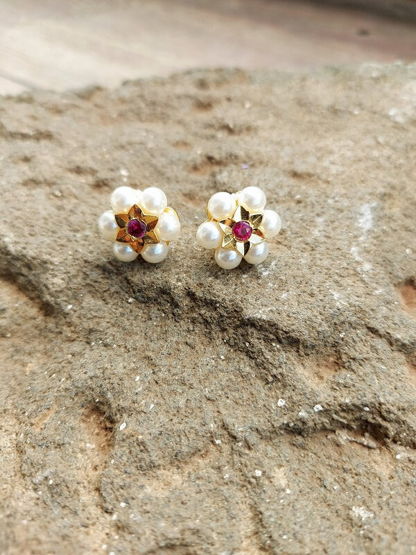 Elegant pearl and ruby flower earrings from Mugdha Jewellery Store