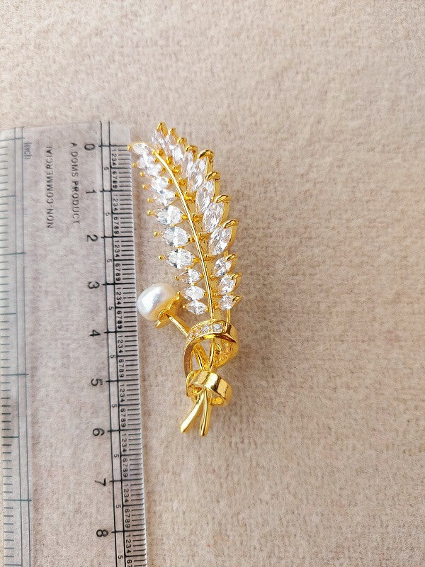 Elegant Gold-Toned Leaf Feather Saree Pin Adorned with White Stones