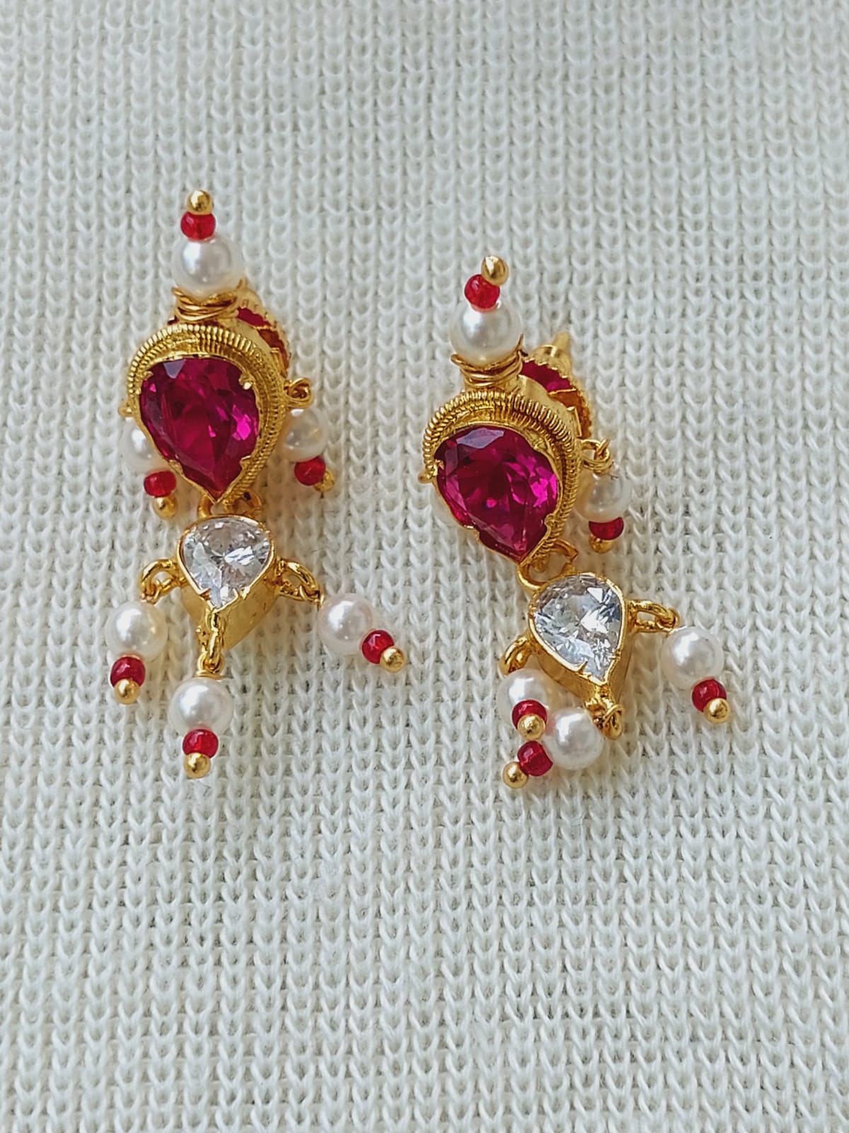 Elegant ruby and pearl necklace from Mugdha Jewellery Store