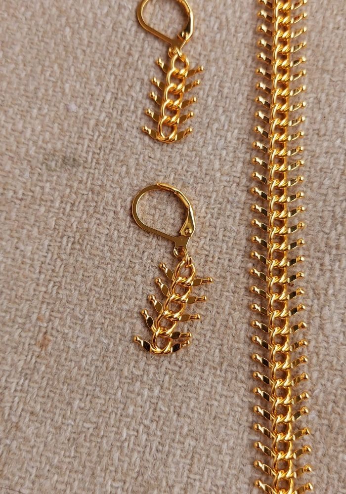 Traditional Durva Haar 30 Inch necklace from Mugdha Jewellery Store, featuring intricate gold-tone metal chains and a leaf-inspired pendant design.