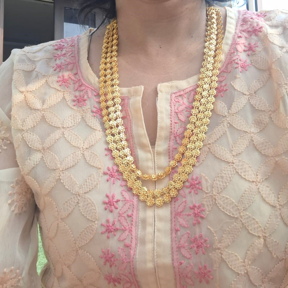 Exquisite Three Lyre Bakul Haar Necklace Adorns Floral Patterned Blouse