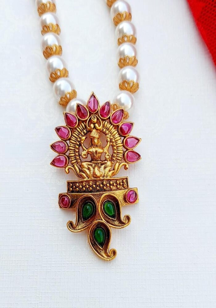 Elegant Goddess Laxmi Temple Jewellery with Intricate Lotus Design and Colorful Gemstones from Mugdha Jewellery Store