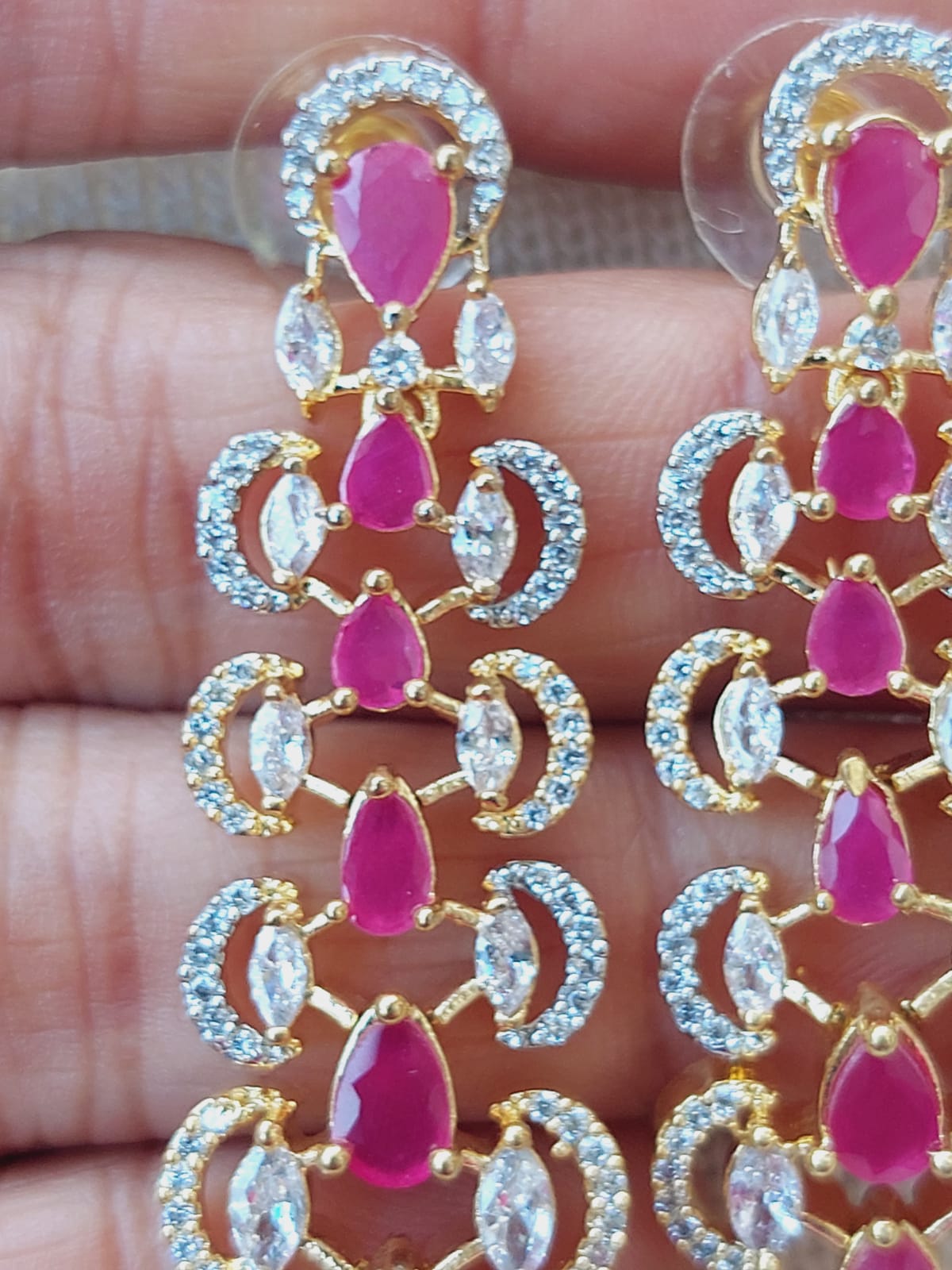 Elegant Gold-Tone Designer Long Earrings with Vibrant Ruby-Colored Gemstones and Sparkling Cubic Zirconia Accents