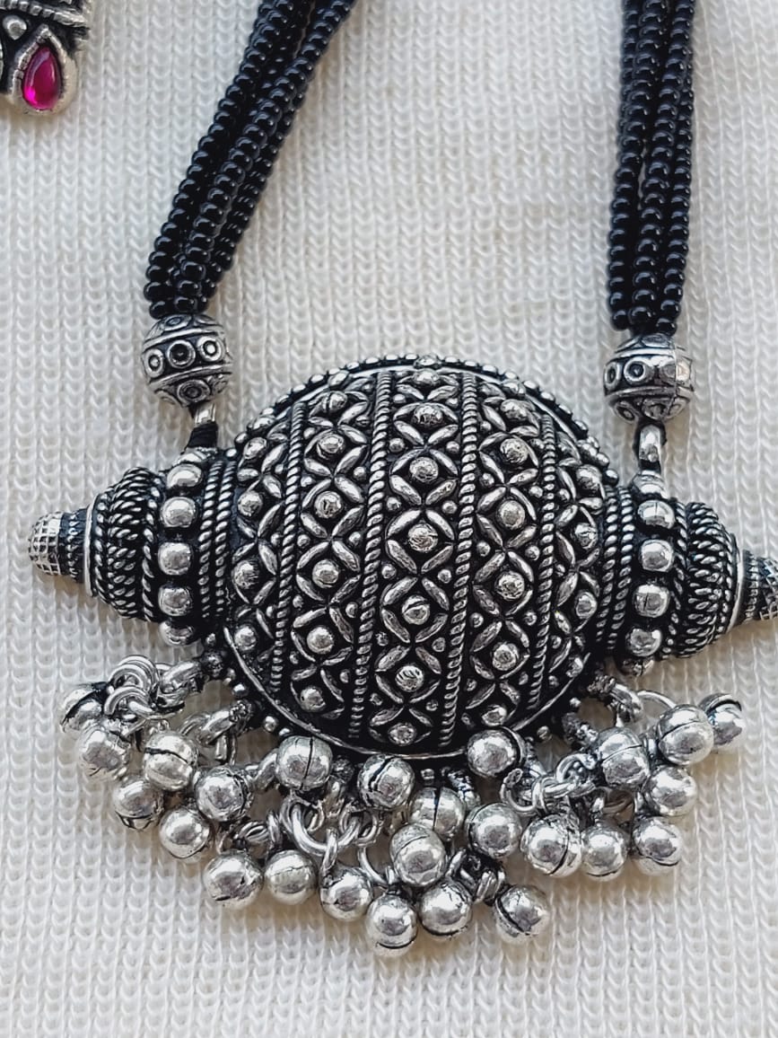 Ornate Oxidized Silver Pendant Necklace with Intricate Filigree Design and Dangling Beads