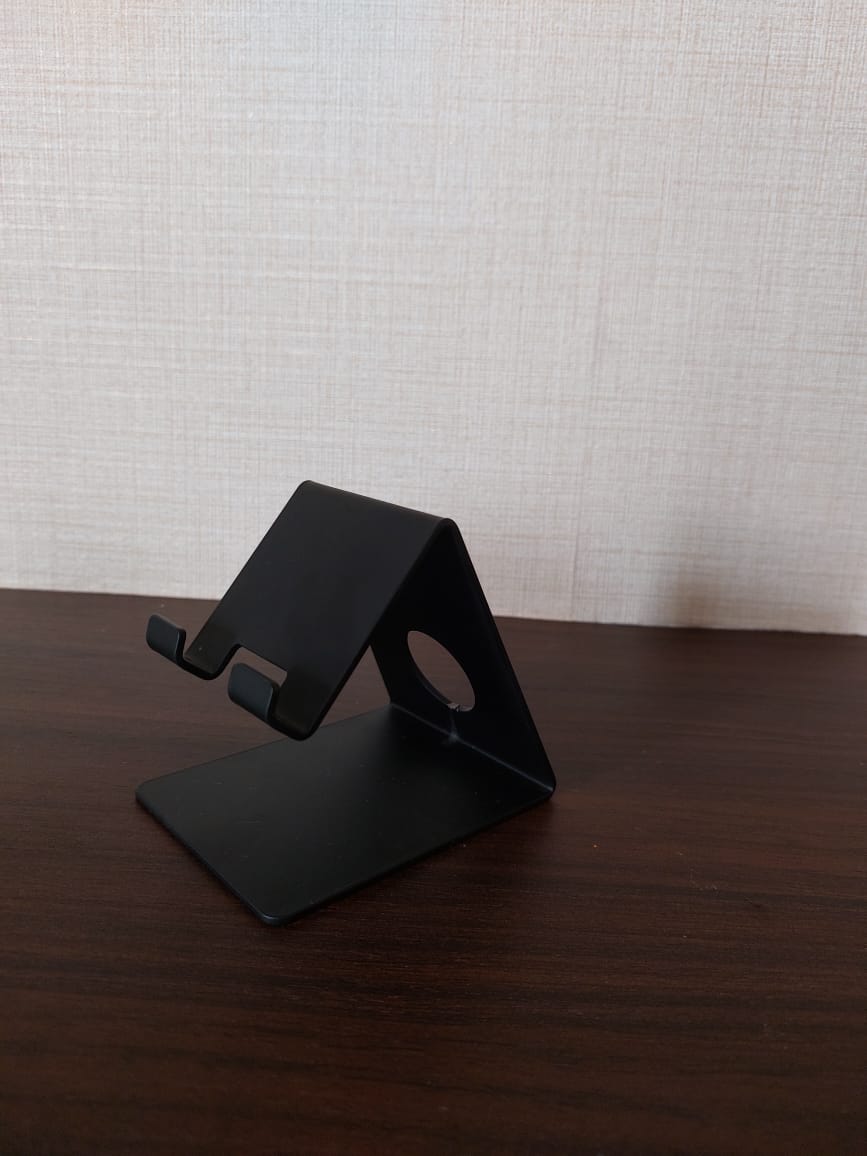 Sturdy black mobile holder on wooden desk