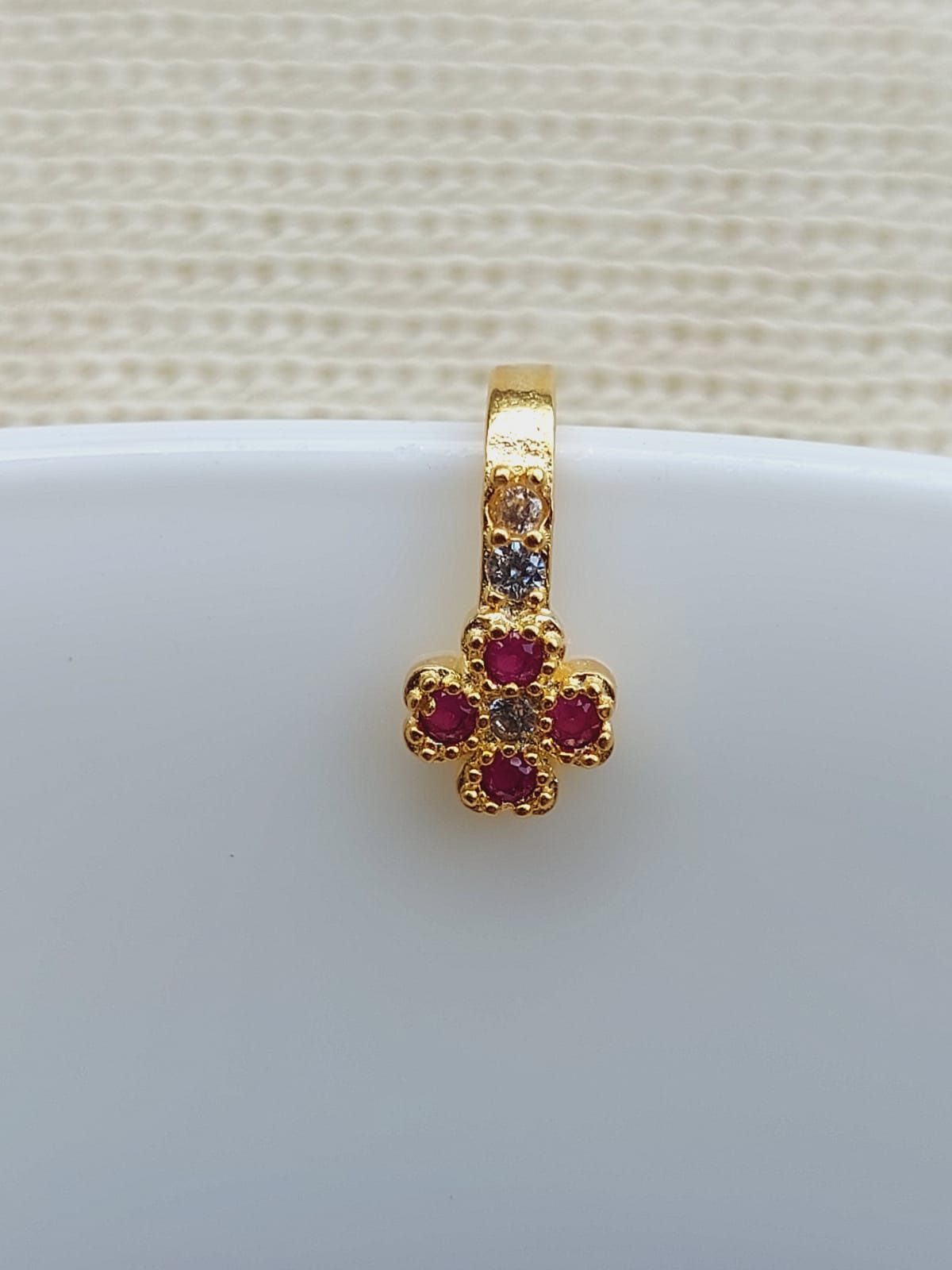 Elegant Red Flower Nose Pin with Sparkling Accents from Mugdha Jewellery Store