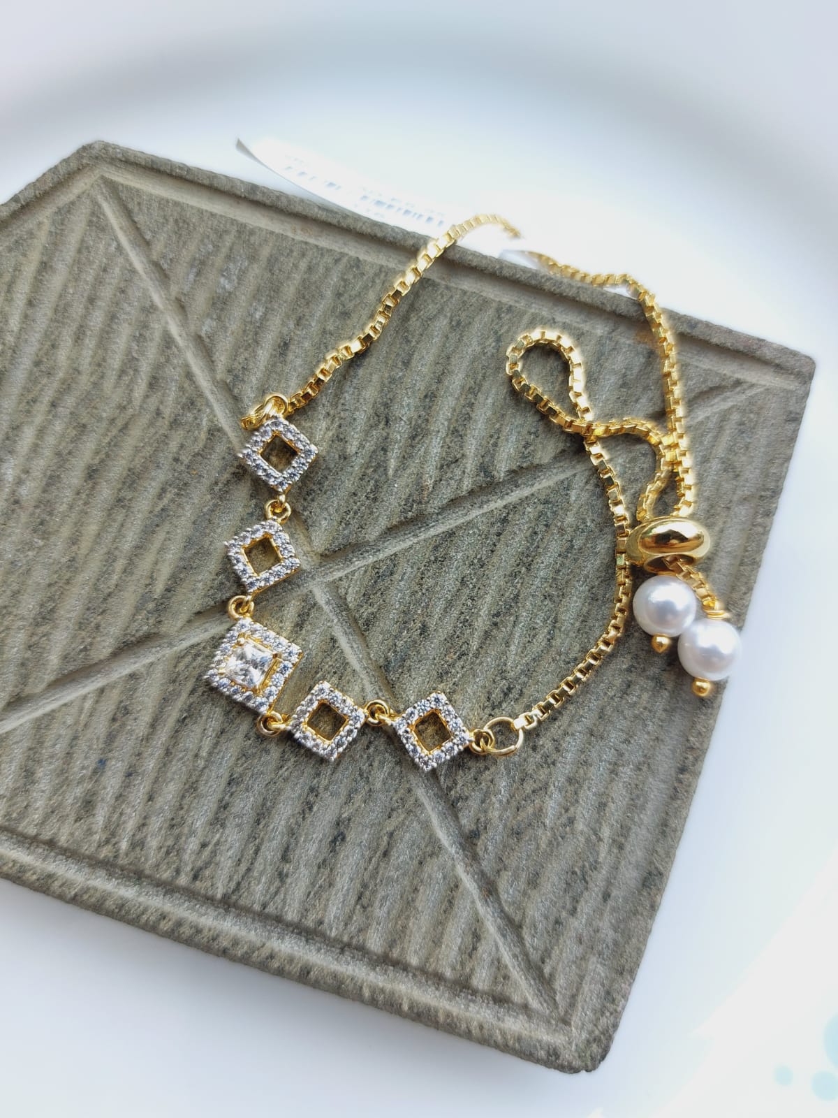 Elegant diamond and pearl bracelet with adjustable design from Mugdha Jewellery Store