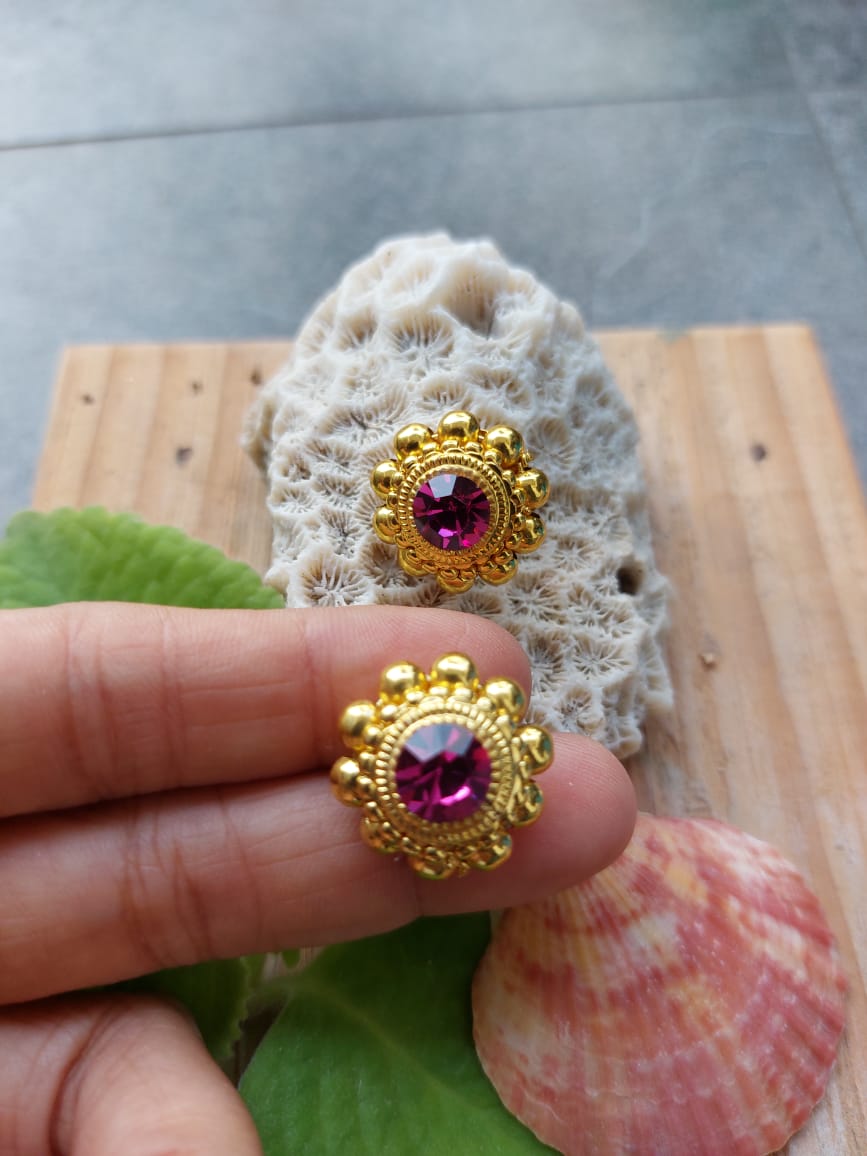 Traditional Saaj Earrings Big Size - Intricate gold-toned earrings with vibrant gemstones, showcased against a natural shell backdrop.