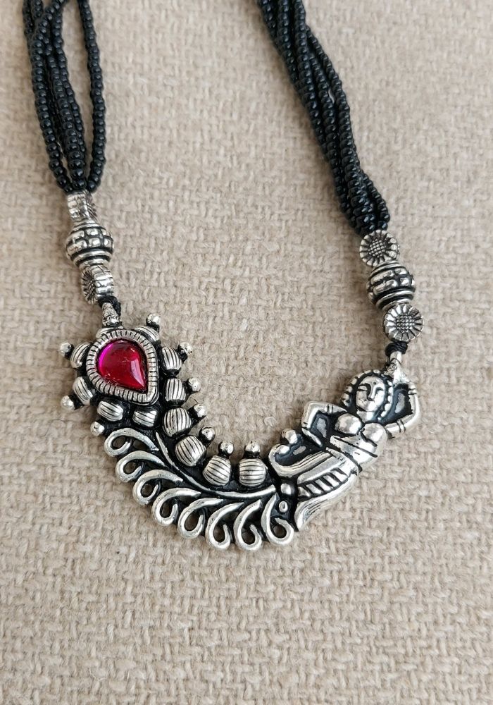 Oxidized Short Mangalsutra Necklace with Intricate Floral Design and Red Gemstone Pendant for Mugdha Jewellery Store