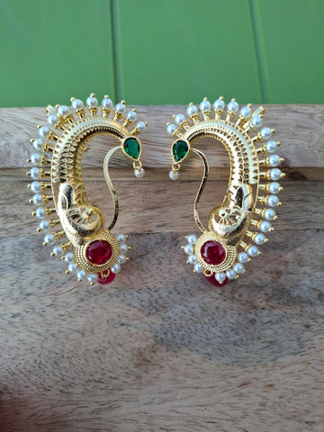 Golden Peacock Royal Kaan